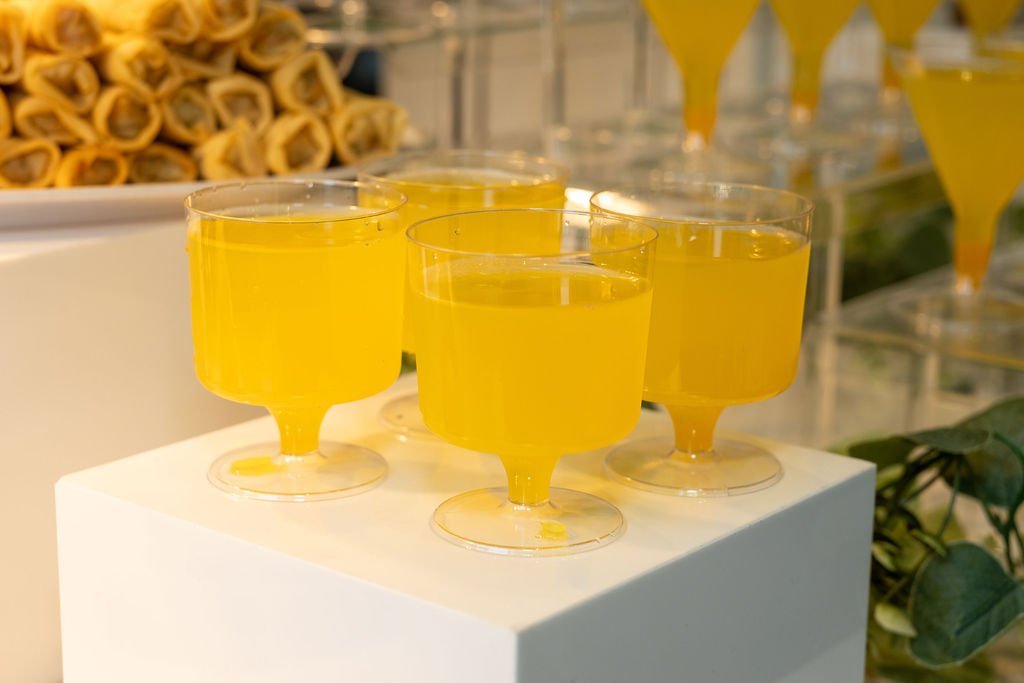 Mocktails served in glass coupes at the drinks station