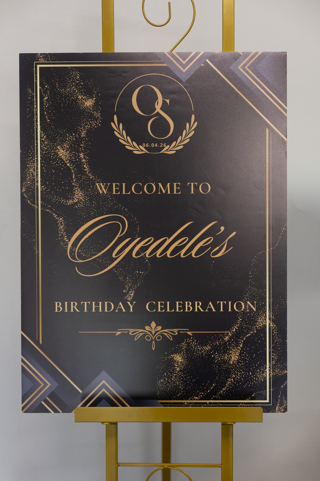 Welcome to Oyedele's Birthday Celebration signage on a gold easel