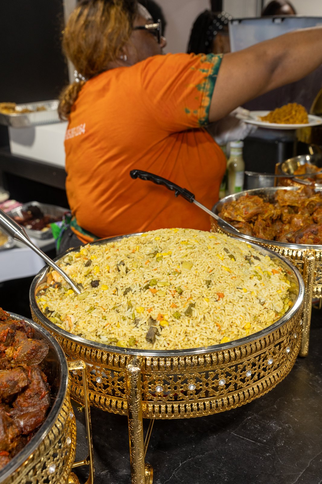 Fried rice served in an ornate gold and crystal chafing bowl