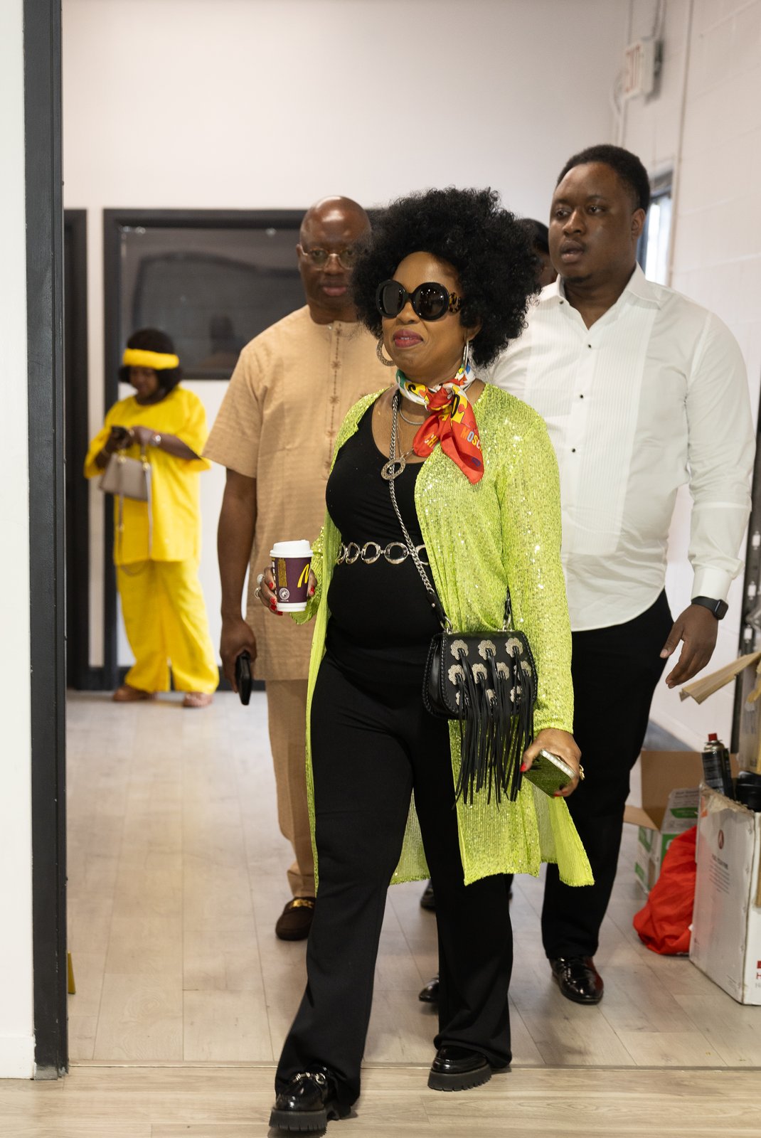 Candid group shot of guests walking through the celebration
