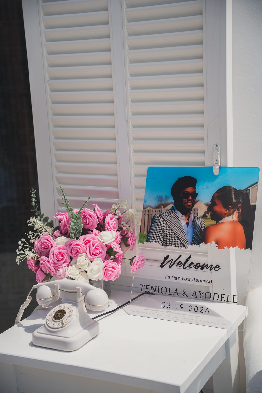 Welcome to our vow renewal signage styled with roses
