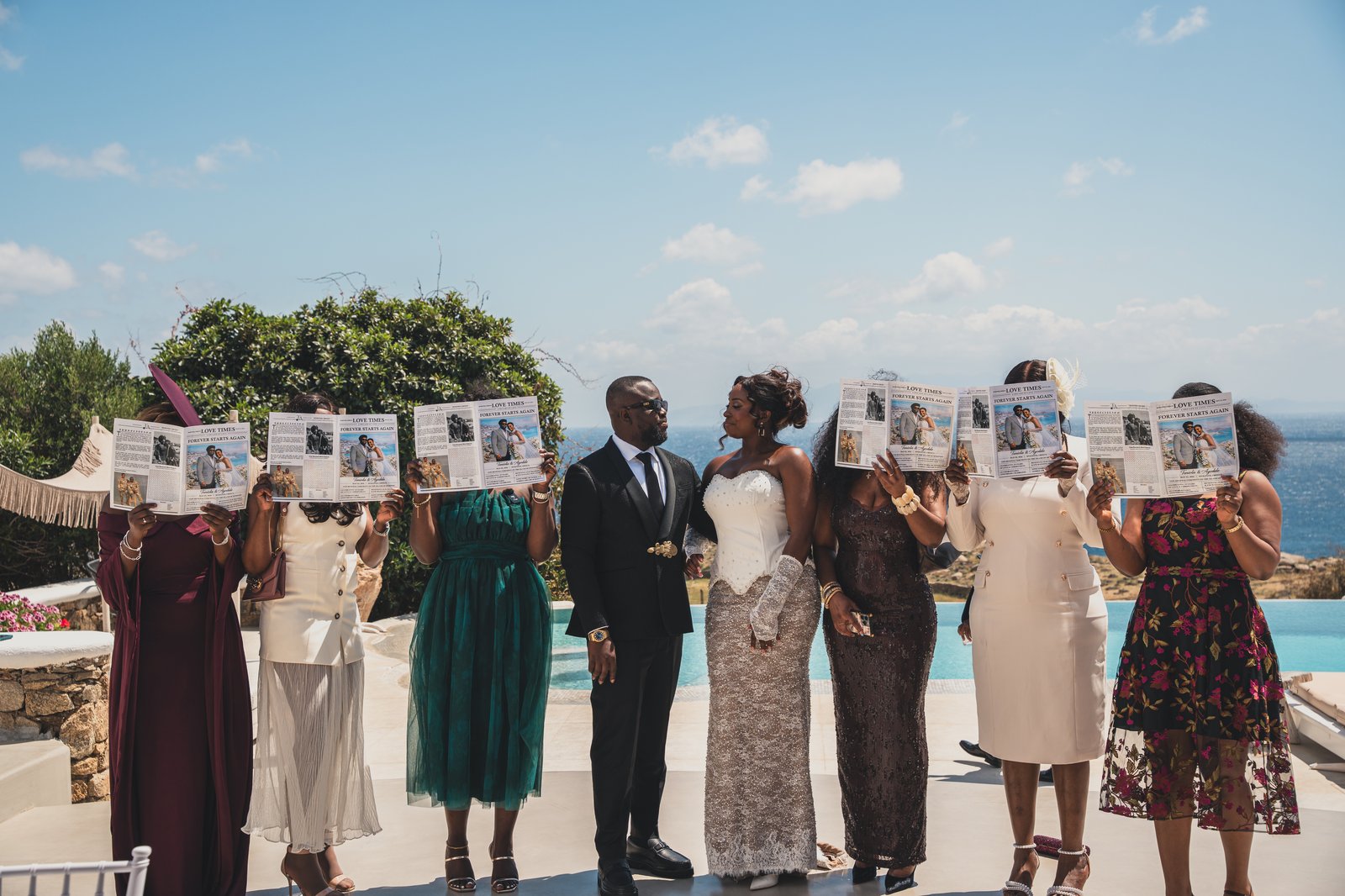 Guests holding up photo cards in celebration