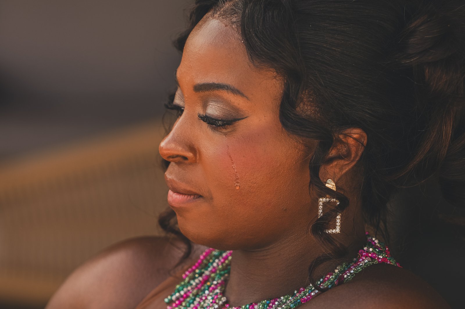 The bride in profile, radiant in her gown
