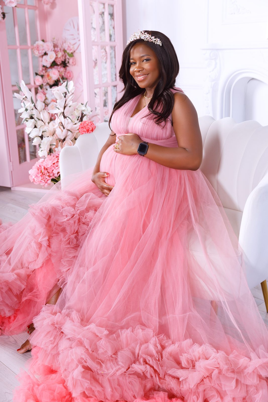 Side profile portrait in a flowing blush gown